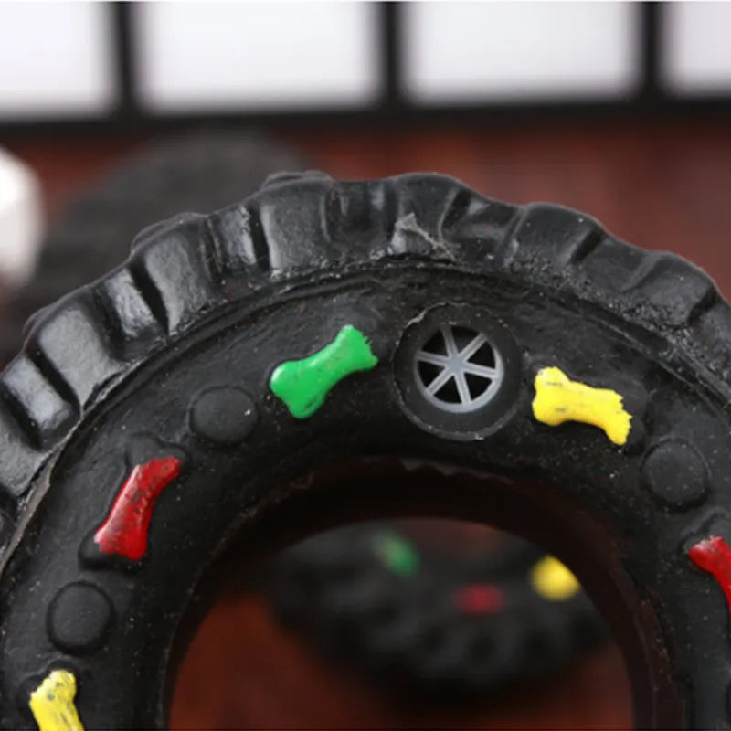 Robust Dog Toy In Tire Shape With Chew Structure And Colourful Details