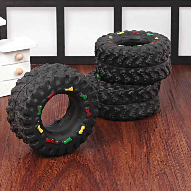Robust Dog Toy In Tire Shape With Chew Structure And Colourful Details