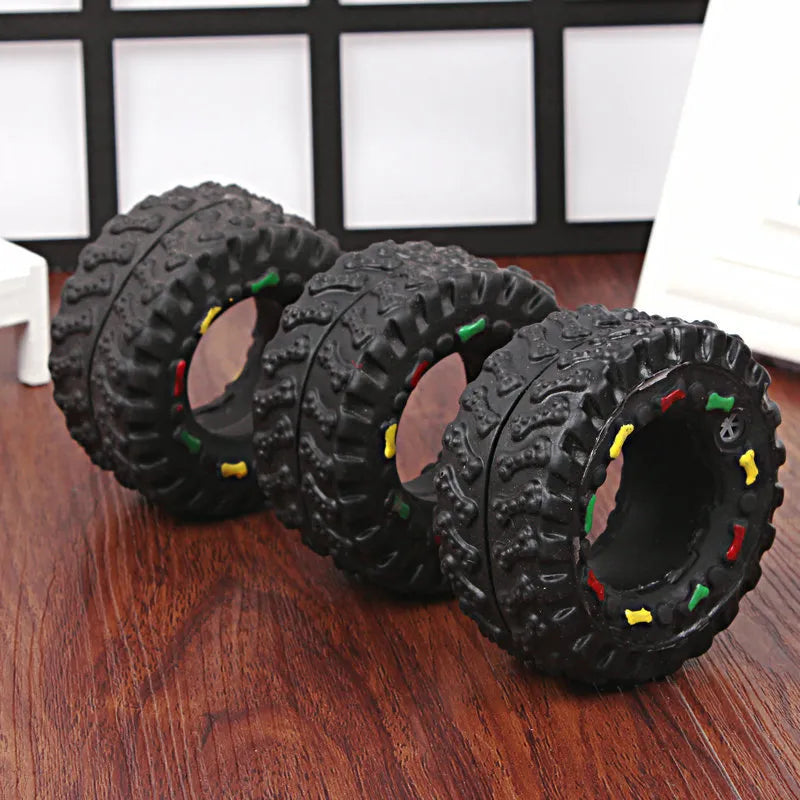 Robust Dog Toy In Tire Shape With Chew Structure And Colourful Details