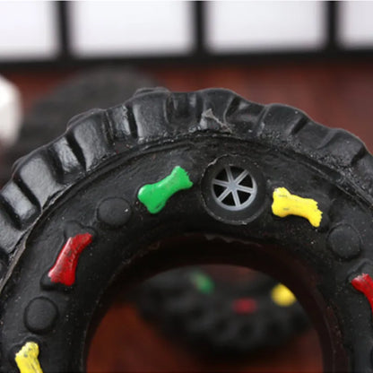 Robust Dog Toy In Tire Shape With Chew Structure And Colourful Details